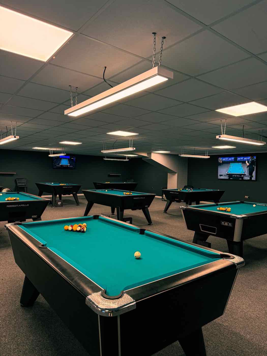 Pool tables and TV screens at Rackzz Pool Club, Dundalk